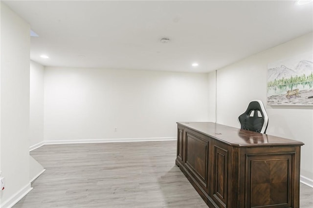 home office with light wood-style flooring, recessed lighting, and baseboards