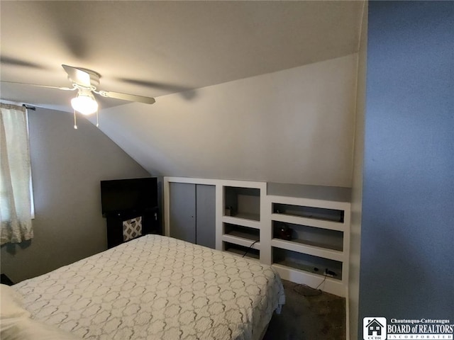 unfurnished bedroom with lofted ceiling and ceiling fan