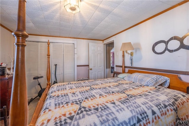 bedroom featuring a closet and ornamental molding