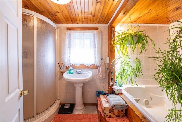 full bathroom featuring tile walls, wood ceiling, a whirlpool tub, and a shower stall