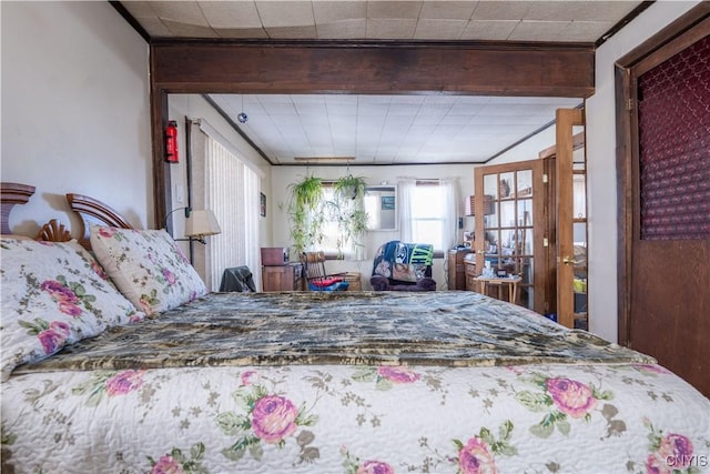 bedroom featuring beamed ceiling