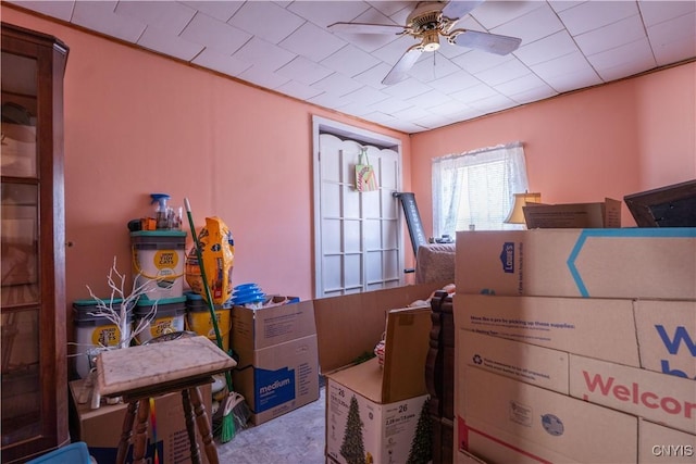 interior space with a ceiling fan