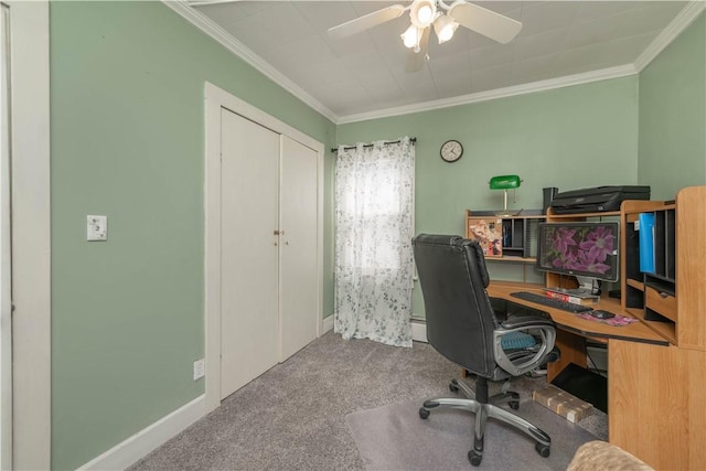 office area featuring baseboards, a ceiling fan, carpet, and ornamental molding