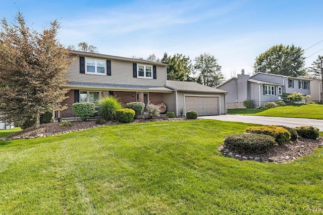 traditional-style home featuring a garage, brick siding, concrete driveway, and a front yard