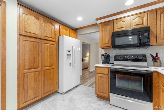 kitchen with decorative backsplash, range with electric cooktop, white fridge with ice dispenser, and black microwave