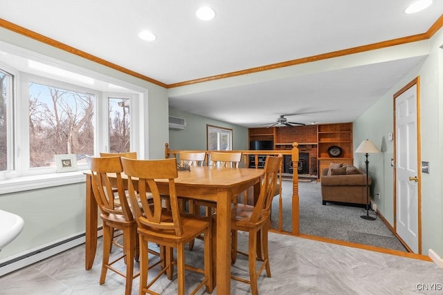 dining space featuring a wall mounted air conditioner, a baseboard heating unit, a brick fireplace, and ornamental molding