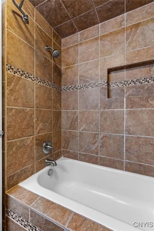 full bathroom with shower / bath combination