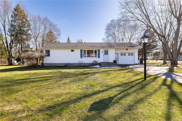 ranch-style home with an attached garage, driveway, and a front yard