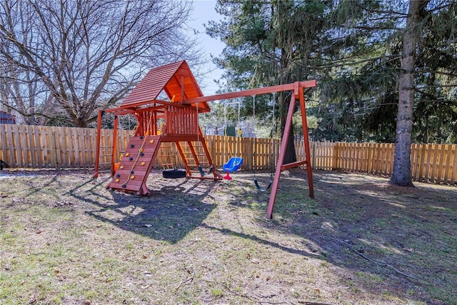 view of play area with a fenced backyard