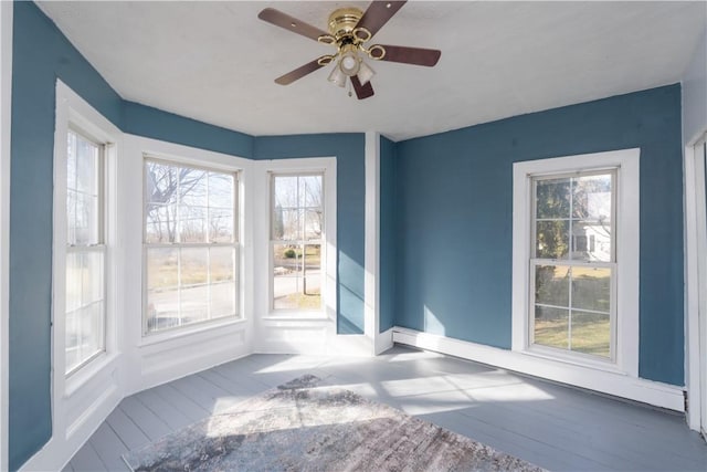 interior space featuring plenty of natural light and ceiling fan