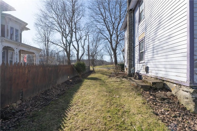 view of yard with fence