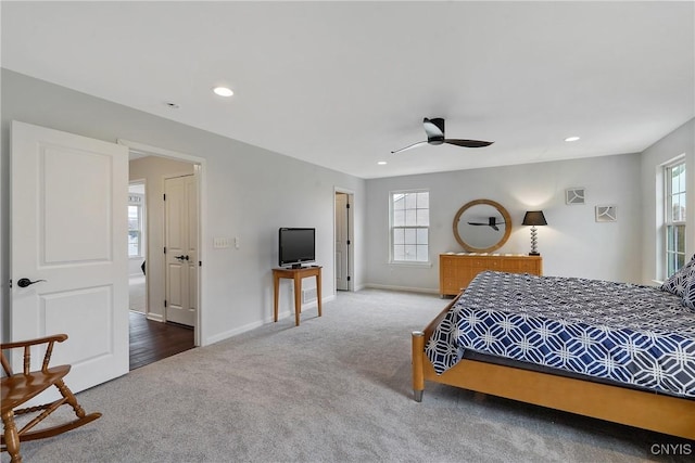 carpeted bedroom featuring recessed lighting, baseboards, and ceiling fan