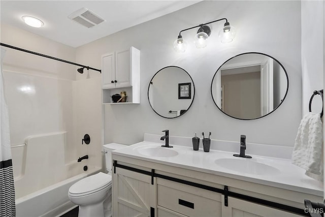 full bathroom featuring double vanity, visible vents, shower / tub combo, and a sink