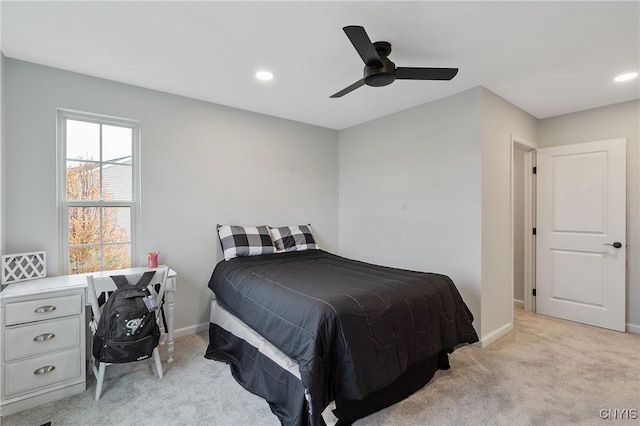 bedroom with recessed lighting, baseboards, light colored carpet, and ceiling fan