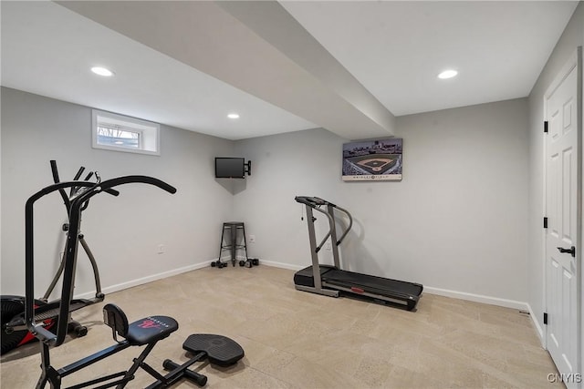 exercise area featuring recessed lighting and baseboards