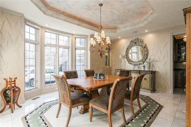 dining space with visible vents, recessed lighting, crown molding, a raised ceiling, and a chandelier