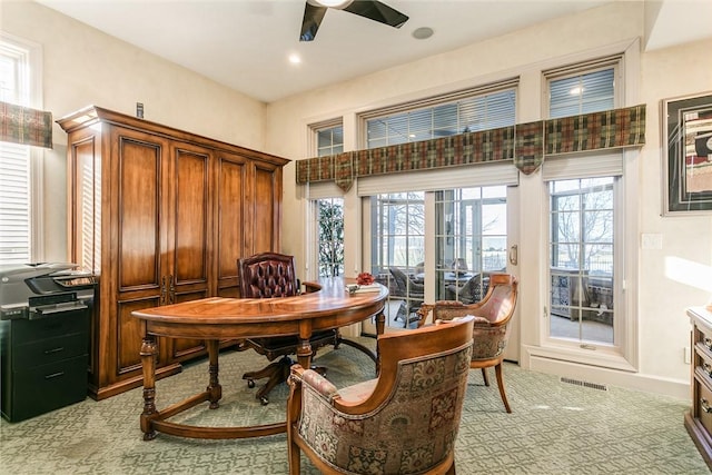 office area with recessed lighting, visible vents, light colored carpet, and a ceiling fan