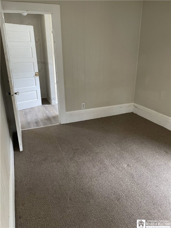 14 Moore Ave, Pomfret, NY 14063 - carpeted spare room with baseboards