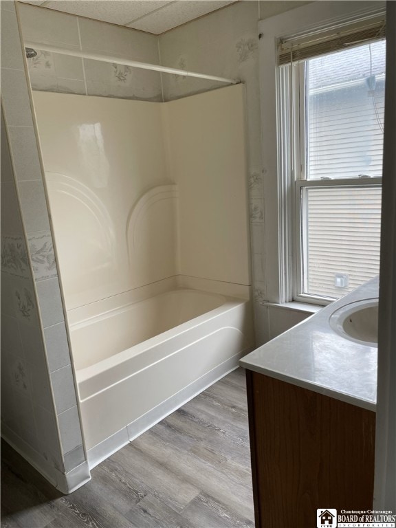 14 Moore Ave, Pomfret, NY 14063 - bathroom featuring shower / bath combination, vanity, and wood finished floors