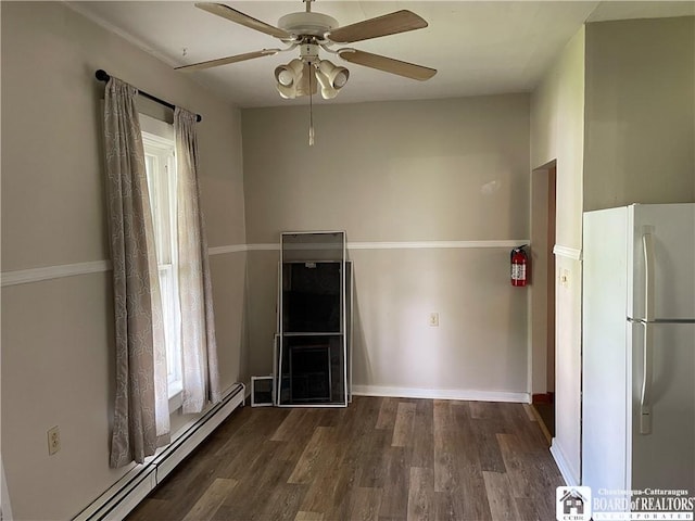 14 Moore Ave, Pomfret, NY 14063 - interior space featuring a ceiling fan, baseboards, baseboard heating, and wood finished floors