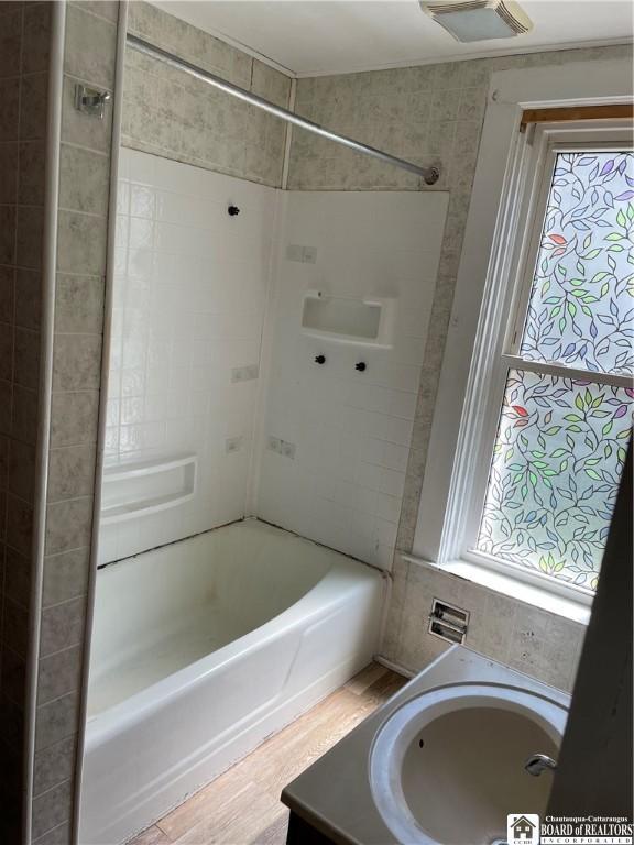 14 Moore Ave, Pomfret, NY 14063 - full bathroom featuring  shower combination, visible vents, a healthy amount of sunlight, and vanity