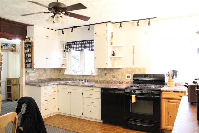 kitchen featuring black appliances, tasteful backsplash, open shelves, and a sink