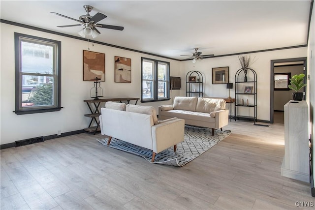21 Avery Ave, Alexandria, NY 13607 - living room with ceiling fan, light wood-style flooring, crown molding, and baseboards