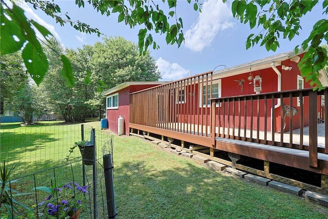 view of yard with a wooden deck