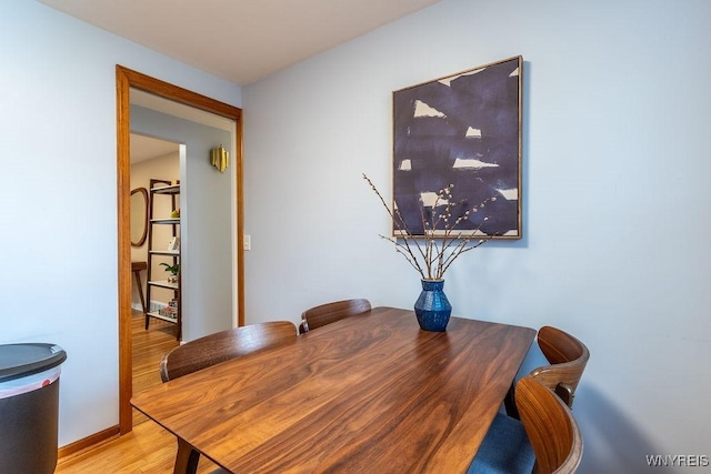 dining area with light wood-type flooring