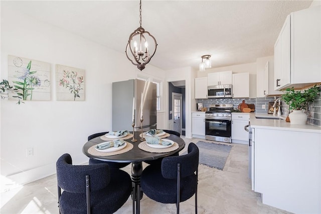 dining area with a chandelier