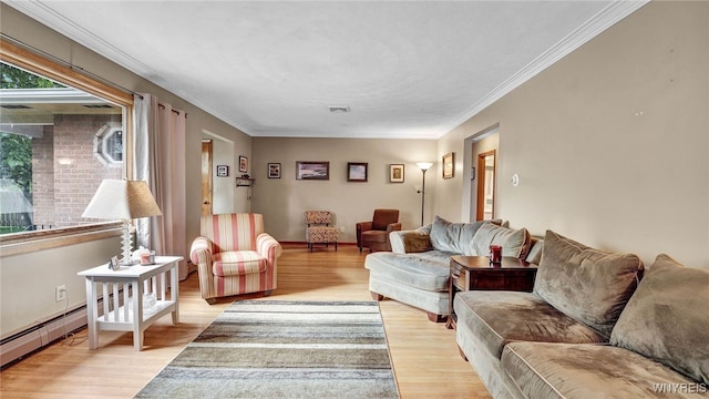 living room with crown molding, light wood-style floors, visible vents, and baseboards