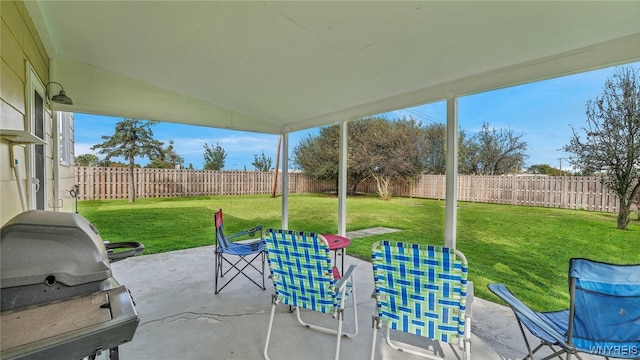 view of patio featuring area for grilling and a fenced backyard