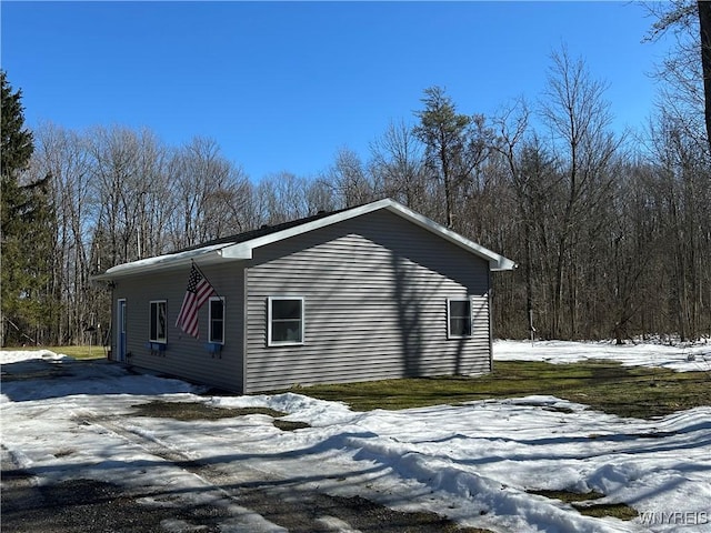 view of snow covered property