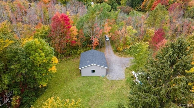 aerial view featuring a view of trees