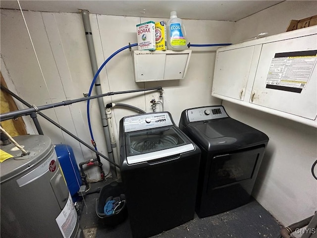 laundry room featuring independent washer and dryer and electric water heater