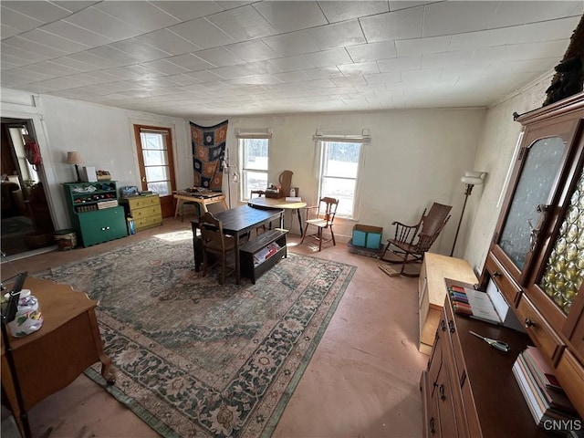 rec room featuring concrete flooring