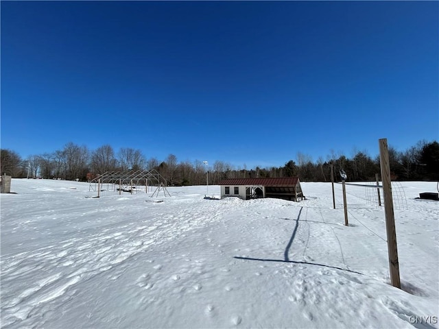 view of snowy yard