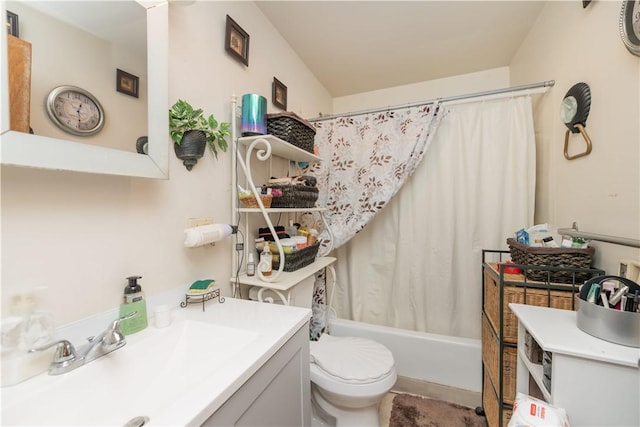 full bath with vanity, shower / bath combination with curtain, and toilet