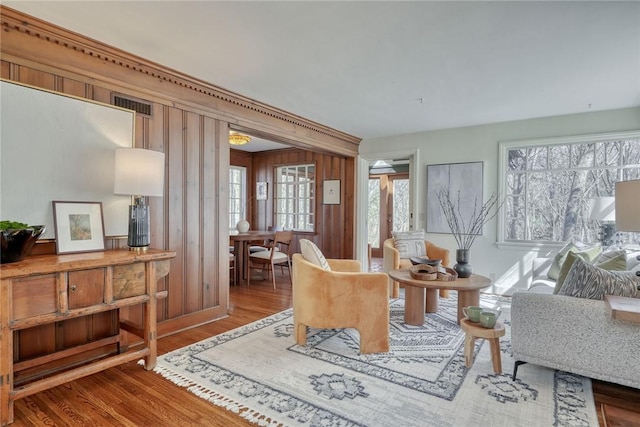 interior space with visible vents and wood finished floors