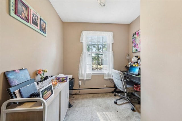 office area with light colored carpet and a baseboard heating unit