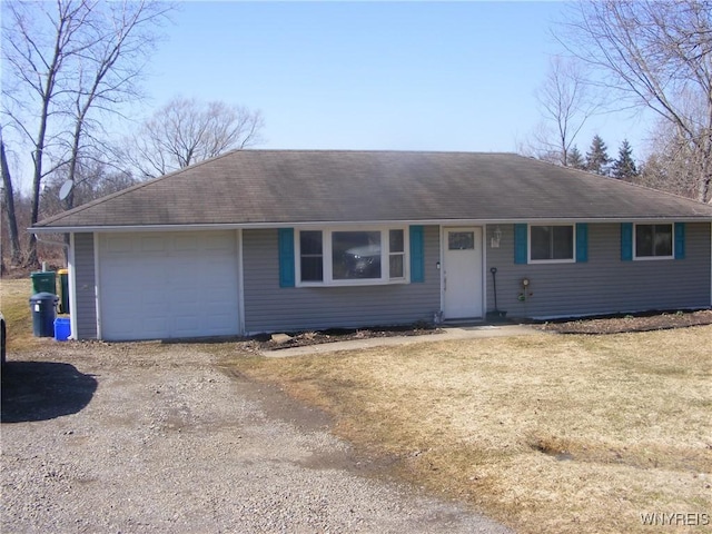 single story home with a front yard, an attached garage, dirt driveway, and roof with shingles