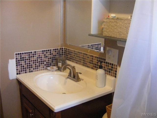 bathroom featuring backsplash and vanity