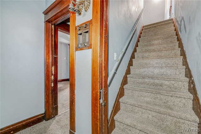 staircase with baseboards