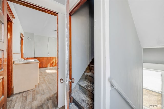 stairway featuring wood finished floors