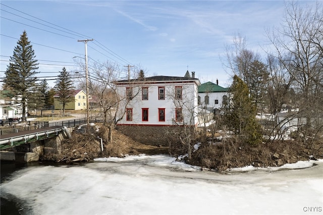 view of home's exterior featuring brick siding