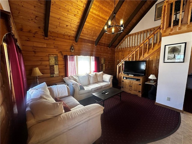 carpeted living area with wooden walls, a chandelier, stairway, wood ceiling, and beam ceiling