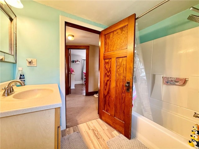 464 Pine St, Erwin, NY 14870 - full bath featuring shower / bath combination with curtain, vanity, and wood finished floors