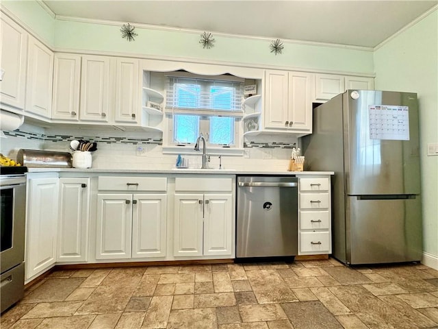 464 Pine St, Erwin, NY 14870 - kitchen with stone finish floor, a sink, stainless steel appliances, white cabinets, and decorative backsplash