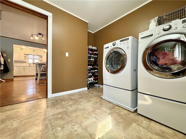 464 Pine St, Erwin, NY 14870 - laundry room featuring baseboards, laundry area, crown molding, and washing machine and clothes dryer