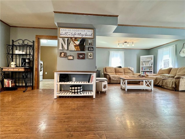 464 Pine St, Erwin, NY 14870 - living area featuring crown molding, washer / clothes dryer, and wood finished floors